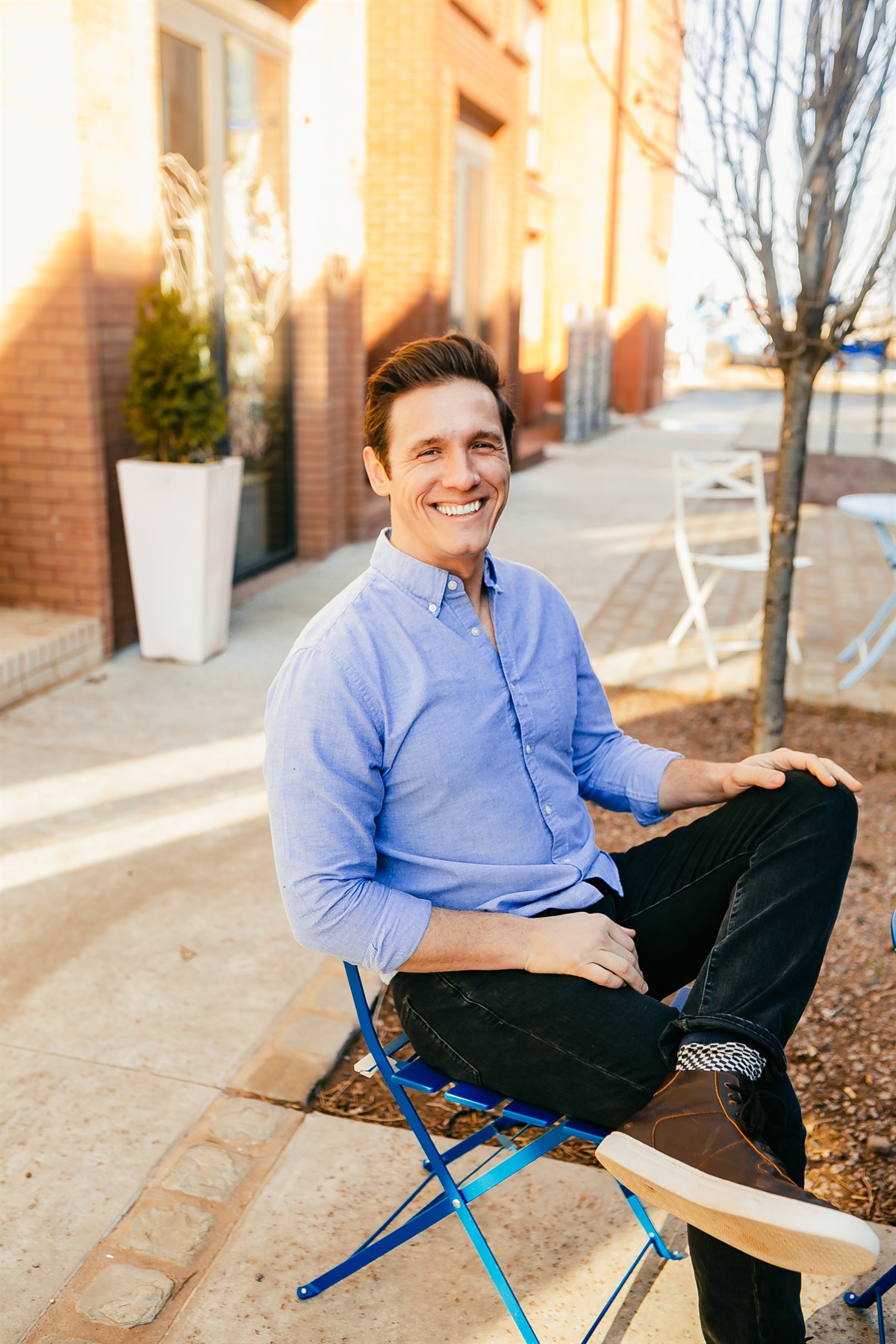 Austin Tunnell, host of the Building Culture Podcast — seated portrait.